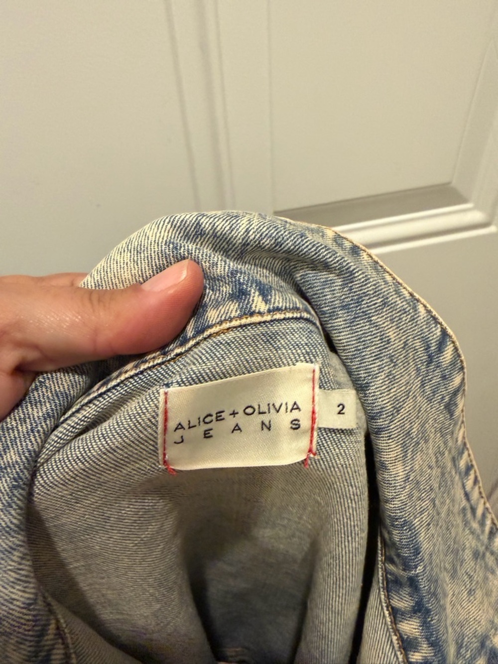 Alice + Olivia Gorgeous Zip-Up Mini Dress in a light wash denim - Picture 4 of 4